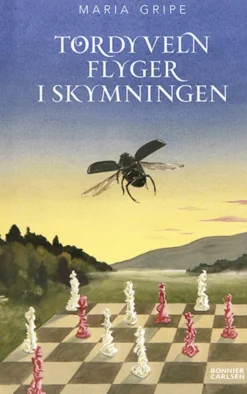 Tordyveln flyger i skymningen